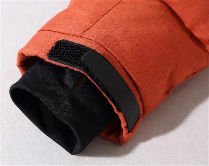 - 20 durable men's winter parka - orange (close up view)